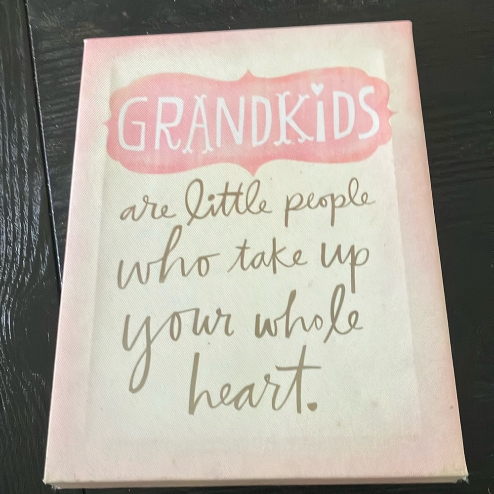 Painting white center table top print with the word Grandkkids in pink